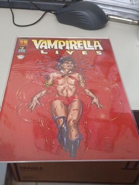 Vampirella Lives Red Graphic Comic  by